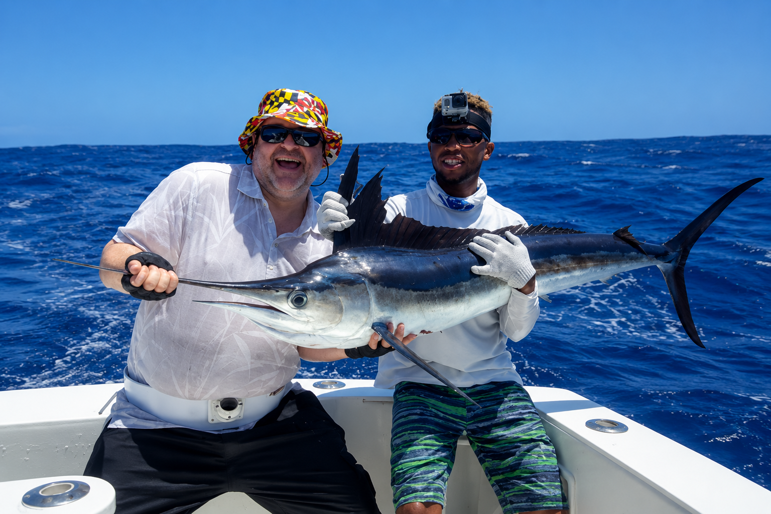 Guests holding a trophy White Marlin during a deep sea fishing charter in Punta Cana Dominican Republic