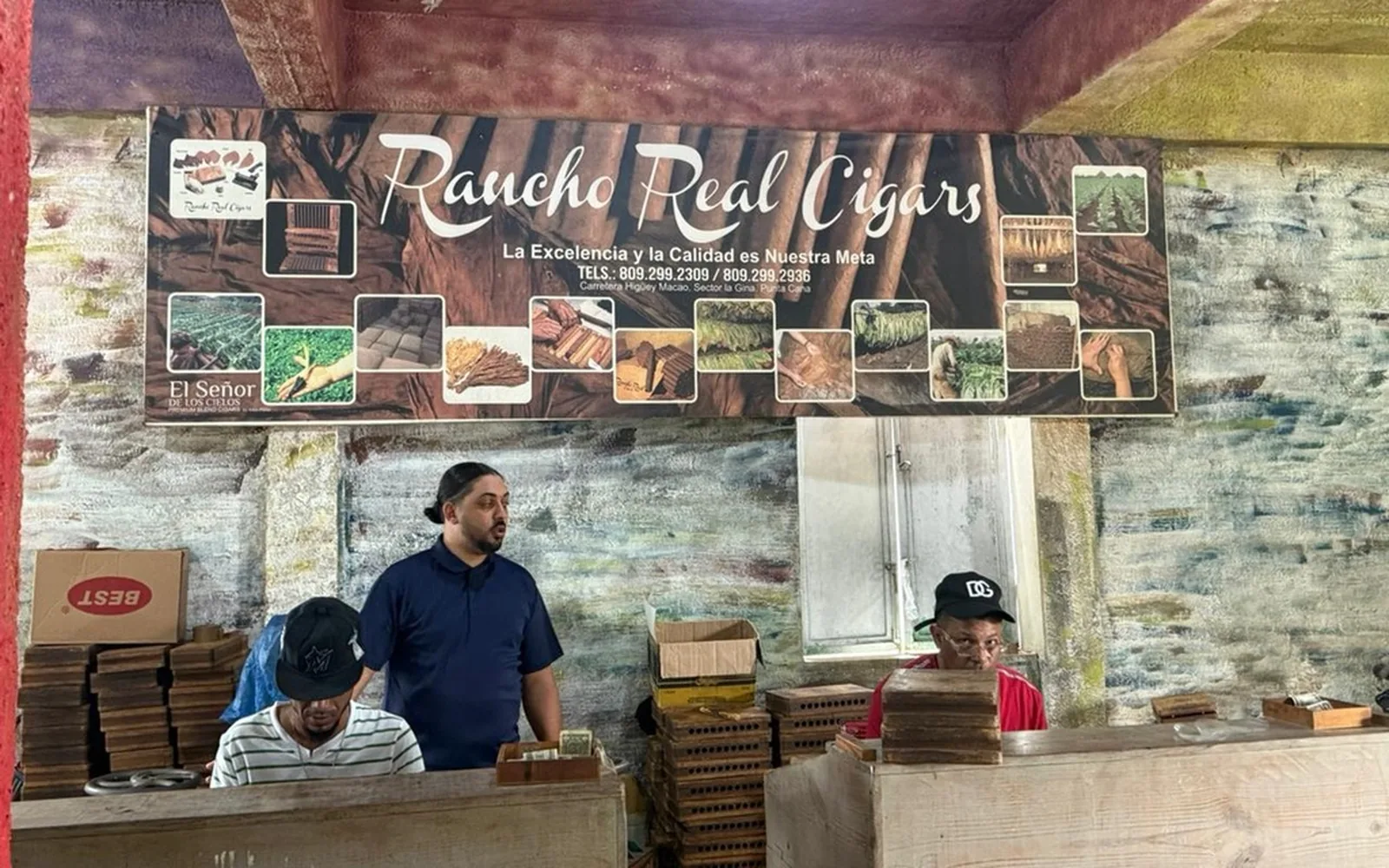 Local artisans demonstrating Dominican cigar making at Rancho Real Cigar Factory